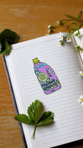 Puhelina Creative Trauma remover tarra